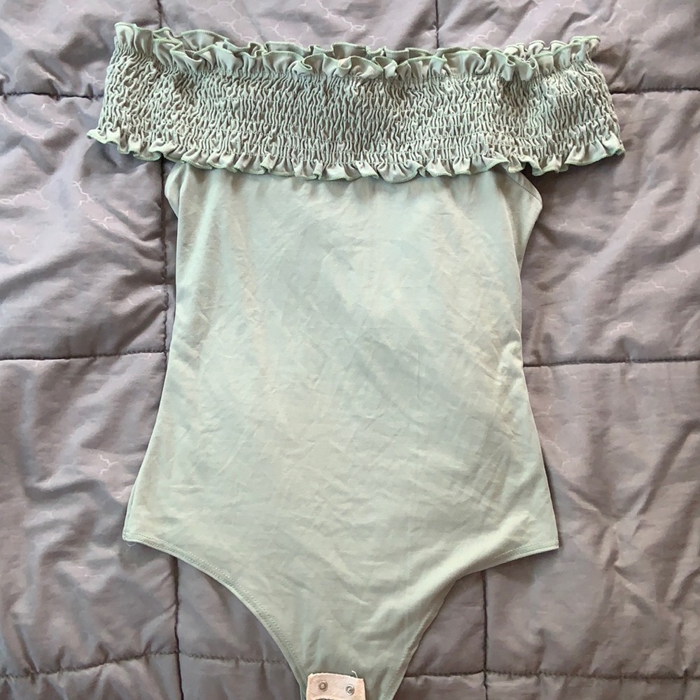 Sleeveless off the shoulder body suit